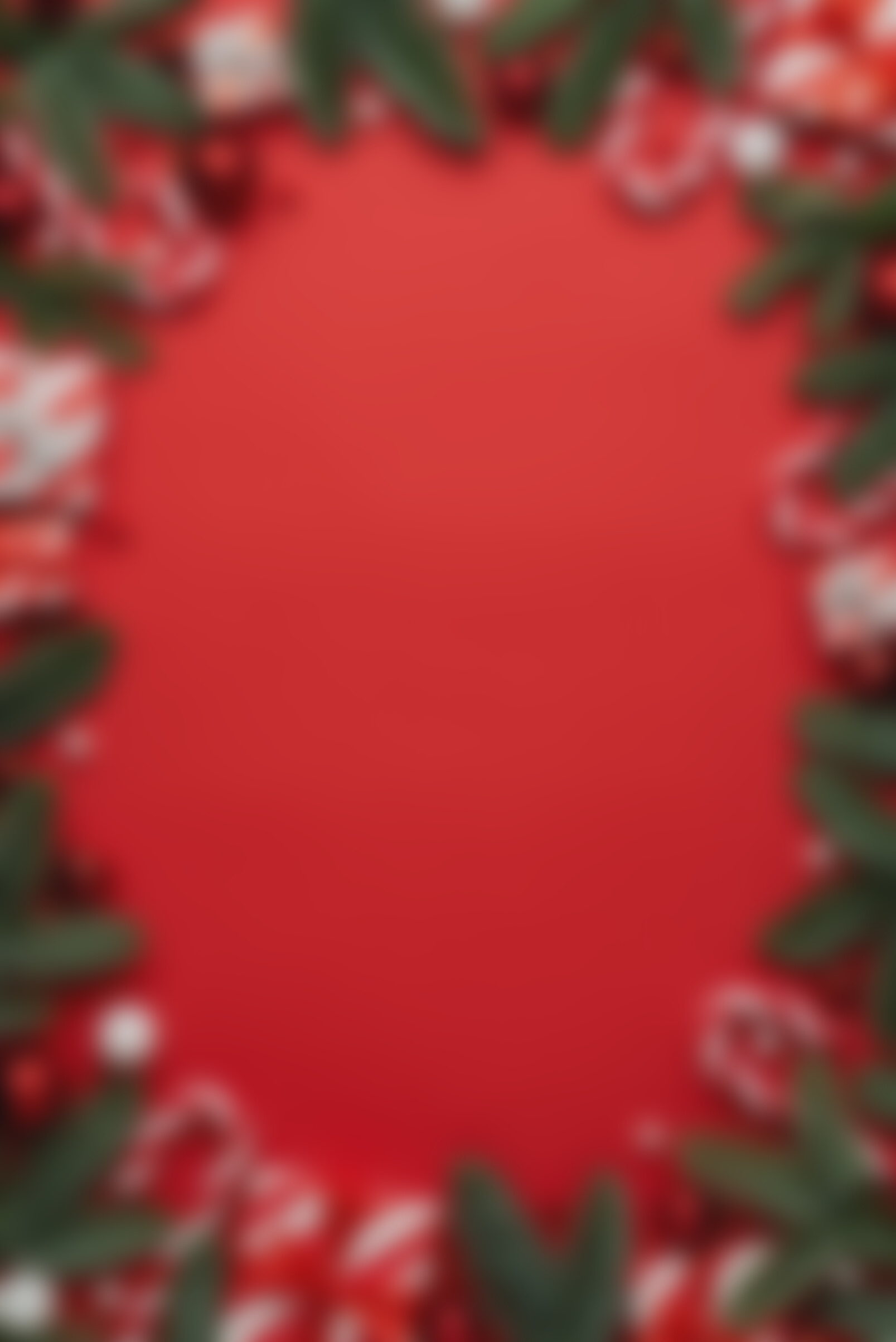 Red Background with Christmas Gift Boxes and Christmas Decorations Frame